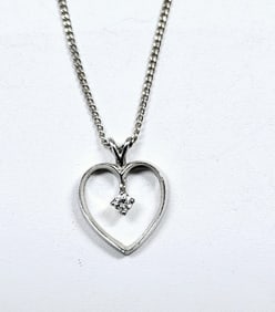 14K White Gold Diamond  Heart Necklace Necklace weighs 2.6