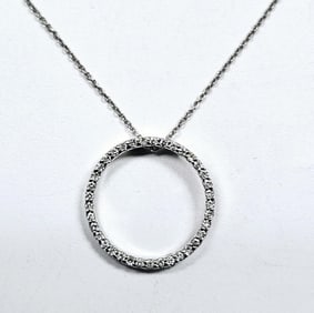 18K White Gold Diamond Eternity Circle Necklace Necklace weighs 3.4 Grams Measures 18"