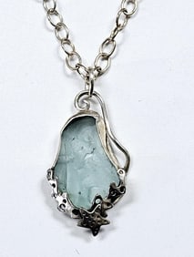 Sterling Silver Blue Sea Glass Necklace Necklace weighs 15.8 Grams Measures 20"