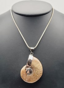 Sterling Silver Ammonite Fossil Necklace Necklace Measures 24"  Necklace Weighs 39.1 Grams