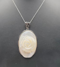 Sterling Silver Carved Mother of Pearl Necklace Necklace Measures 20"  Necklace Weighs 14.9 Grams
