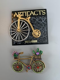 Lot of 2 Bicycle Brooches One Signed JJon On original card. Front wheel spins.