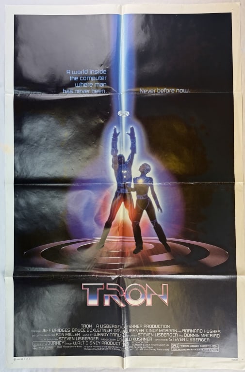 1982 Tron Theatrical One Sheet Movie Poster Poster measures 27"x 41": Poster measures 27"x 41" Folded From closed movie theater collection. Pin holes in corners. Some wrinkles/creasing on fold lines. See photos for condition details.