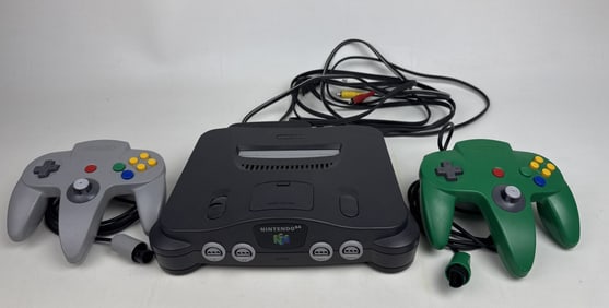 Nintendo 64 Console w Cables 2 Controllers Powers on. Untested with any games.
