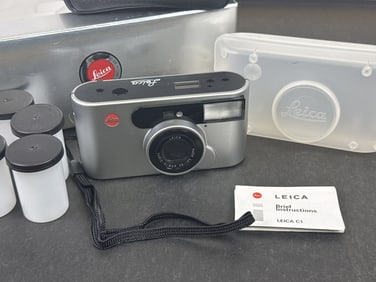 Leica C1 Point and Shoot 35mm Camera Includes box, hard case, soft case and film cans. Untested. No
