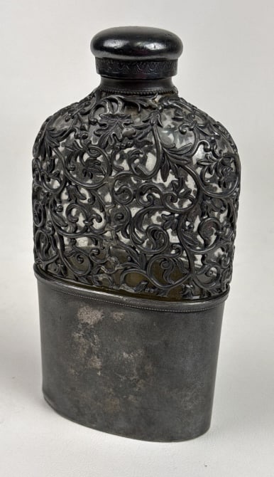 Vintage Orly & Co Pewter and Glass Flask Glass in excellent condition. Tarnish and age on: Glass in excellent condition. Tarnish and age on metal. Vintage Finely decorated Pewter and Glass Flask