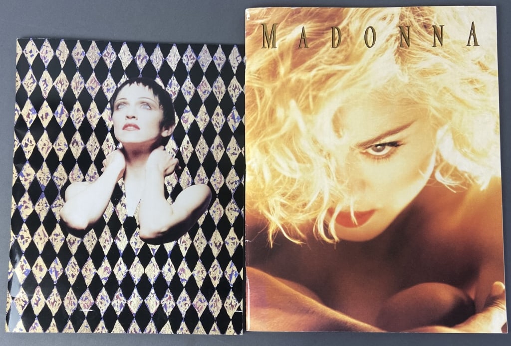 Madonna Tour Books & Ticket Stubs 1990, 1993 Tour books for the 1990 Blond Ambition tour and the: Tour books for the 1990 Blond Ambition tour and the 1993 Girlie Show tour. Each include a ticket stub for their respective tours. Blond Ambition tour book has some small tearing along the top of back 