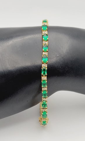 Gold Tone Green and White Rhinestone Bracelet Bracelet Measures 6": Bracelet Measures 6" Bracelet Weighs 10.2 Grams Metal Not Stamped