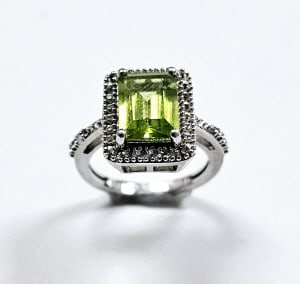 Sterling Emerald Cut Peridot Diamond Accent Ring Ring weighs 4.0 Grams Size 5: Ring weighs 4.0 Grams Size 5