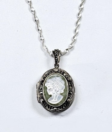 Sterling Silver Cameo Locket Necklace Necklace weighs 13.6 Grams Measures 20": Necklace weighs 13.6 Grams Measures 20"