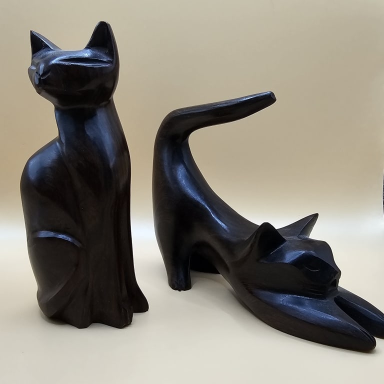 Vintage Ironwood Cat Figurine Hand carved. Ironwood. 4.5" tall. This item is located in Leesburg: Hand carved. Ironwood. 4.5" tall.This item is located in Leesburg Florida.