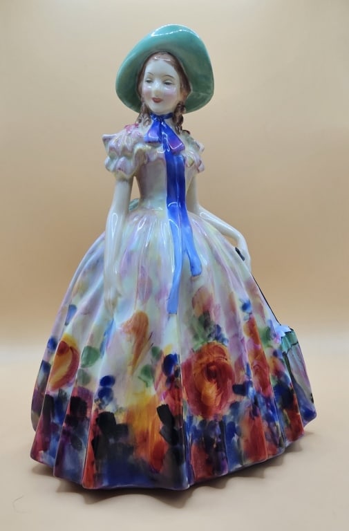 Royal Doulton 1945 Easter Day Woman Figurine Royal Dalton 1945 HN 2039 W. 7.75" tall. This item is: Royal Dalton 1945 HN 2039 W. 7.75" tall.This item is located in Leesburg Florida.