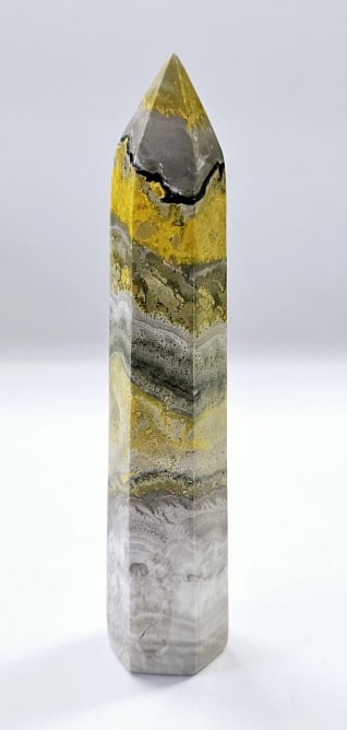 Polished Bumblebee Jasper Tower Tower weighs 53.8 Grams Small crack on bottom. See photos 5&6: Tower weighs 53.8 GramsSmall crack on bottom. See photos 5&6