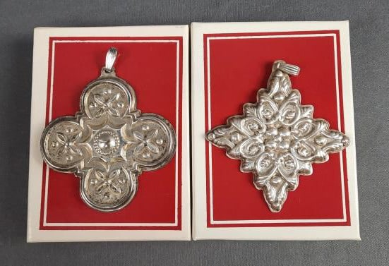 Reed & Barton Christmas Cross Sterling Silver Ornaments 1986 & 1989 1986 TGW 14.6 1989 TGW 11.6 Some: Ornaments 1986 & 19891986 TGW 14.61989 TGW 11.6Some tarnishing. Please see images for details regarding the condition.