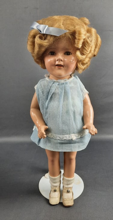 Vintage Ideal Shirley Temple Doll Stand not included. Clothes stained, face dirty. Some cracking to: Stand not included. Clothes stained, face dirty. Some cracking to body, especially face and legs. Please see images for details regarding the condition.