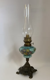 Ceramic and Brass Oil Lamp Oil lamp with brass base and ceramic body with flowers. Glass chimney is