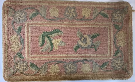 Antique Floral Hooked Rug Pink and white hooked rugs with flowers in the center. Rug is 30 X 18 1/2