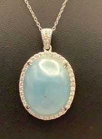 Aquamarine Rhodium Over Sterling  Necklace Necklace is 18" long. Necklace weighs 11.8 TGW