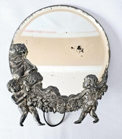 Antique  Cherub & Man In The Moon Vanity Mirror Loss of the silver on the reflective coating on the