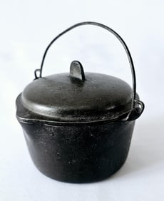 Vintage Wagner Ware Cast Iron Miniature Pot No noticeable damage.