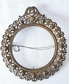 Antique Round Brass Ornate Mirror/Picture Frame Good condition. No issues reported.