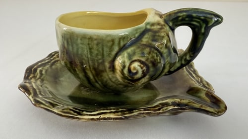 Majolica Conch and Oyster Shell Cup Saucer Cup measures approximately 2 inches tall by 3 inches