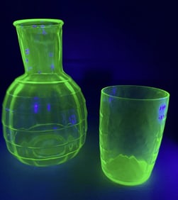 Uranium Glass Tumble Up Glass and Carafe No cracks or chips.  Carafe 6 inches tall. Glass 3.5