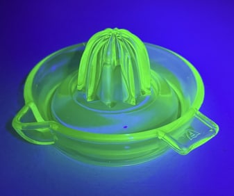 Uranium Glass Fireking Citris Juicer No chips or cracks. Approximately 6 inches wide.