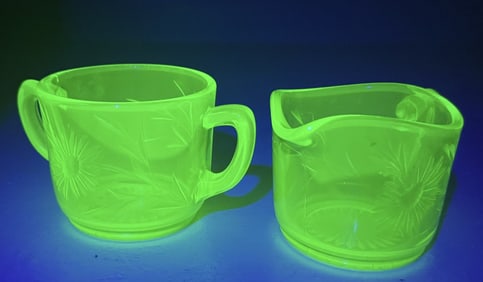 Uranium Glass Creamer and Sugar Bowl Daisy pattern. No chips or cracks. 3 inches tall