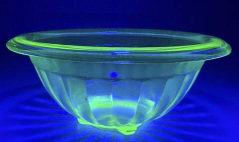 Uranium Glass Ribbed Bowl 7 inches wide by 2.5 inches tall. No cracks or chips.