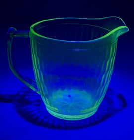 Uranium Glass Pitcher Approximately 5 inches tall. No cracks or chips.