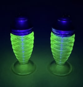 Uranium Glass Salt & Pepper Shakers Tarnish and some corrosion on metal parts. No chips or cracks.