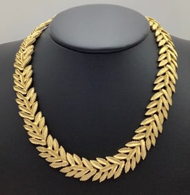 Vintage Gold Tone Crown Trifari Leaf Necklace Necklace is 14" total length.