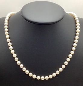 Vintage 14K Yellow Gold  Genuine Pearl Necklace 14K clasp. Necklace measures 18"