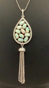 925 Sterling Opal Cluster & CZ Teardrop Necklace Necklace is 25" Necklace weighs 5.5 TGW