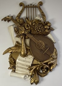 Mid Century Syroco Music Wall Hanging Hard plastic wall hanging featuring a harp, lyre, and sheet