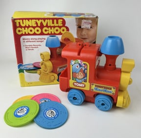 Vintage Tuneyville Choo Choo With box and 4 discs. Untested. Water damage on box.