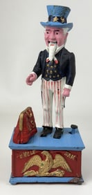 Vintage Cast Iron Uncle Sam Bank 11 inches tall. 5 inches wide. Mechanical movement partially