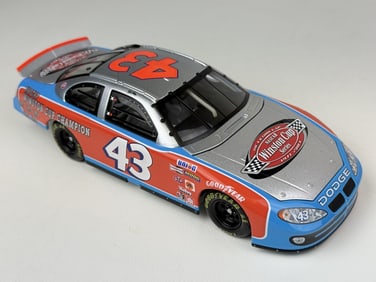 Die Cast Richard Petty Victory Lap Dodge 1/24 Action. See photos for condition details.