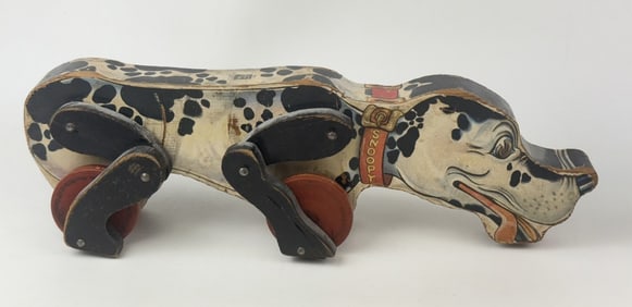 Vintage Wooden Fisher Price Snoopy Dog Pull Toy Approximately 17 inches long. Missing tail portion