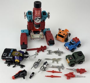 Vintage G1 Transformers Lot 4 robots and an assortment of weapons and buzzsaw head. Play wear