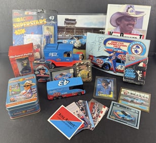 Richard Petty Memorabilia Lot Trading cards, playing cards, car toys, book, action figure, signed