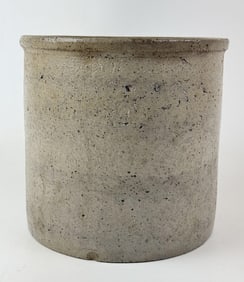 Antique Stoneware Crock 7.5 inches tall by 7 inches wide.