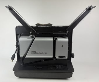 Vintage Telex Instaload XL 16mm Film Projector Model 2210 motor and bulb functions. Not tested with