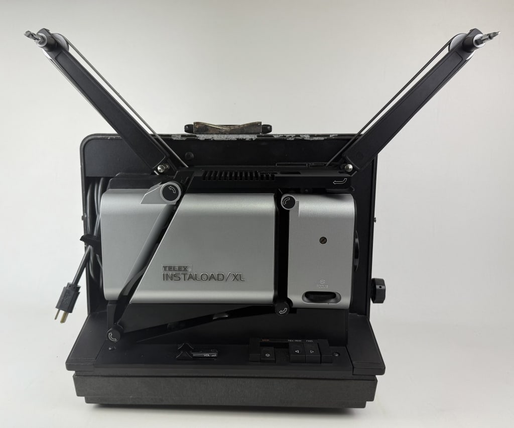 Vintage Telex Instaload XL 16mm Film Projector Model 2210 motor and bulb functions. Not tested with (1 of 9)