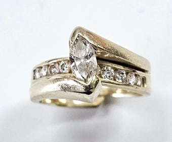 14K Yellow Gold Marquise Diamond Engagement Set Marquise Cut Diamond .35ct. It is graded F in Color