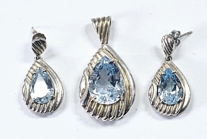 Sterling Faceted Blue Topaz Pendant & Earrings Pendant weighs 9.6 TGW Earrings weigh 8.3 TGW
