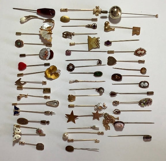 Assorted Antique & Vintage Stick Pins Some of the pins are missing their: Some of the pins are missing their pin-back. Contents not inspected. This lot weighs 4.6oz.