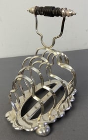 Antique Silver Plate Toast Rack Pearson Brothers Six slot toast rack with black wood handle. Marked