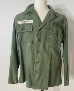 Vintage Vietnam Era Army Shirt Green Army fatigue shirt with name patch, all other patches have been: Green Army fatigue shirt with name patch, all other patches have been removed. Label with faded numbers under collar, all other labels removed. Missing one button, some holes in right sleeve. Measurem
